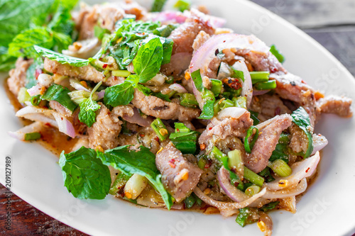 Spicy Thai pork salad, "Larb". Thai Food.
