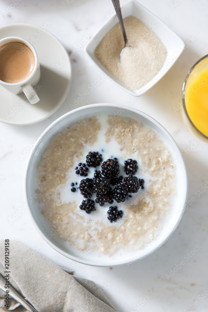 A breakfast of oat porridge with fresh
blackberries A breakfast of oat porridge with fresh
blackberries