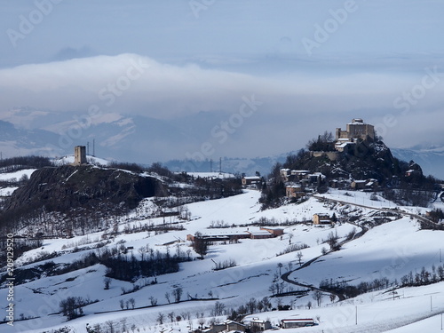 castello di rossena e torre di rossenella innevati photo