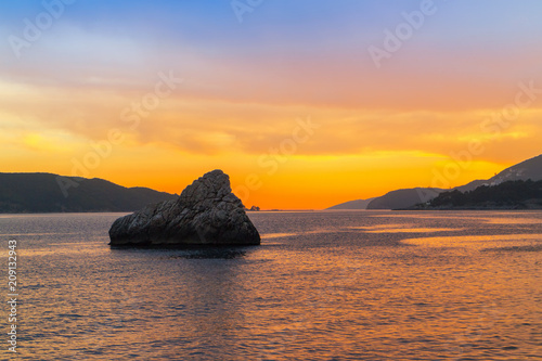Colorful sunset on Adriatic sea near the Budva city in Montenegro  gorgeous seascape and nature landscape
