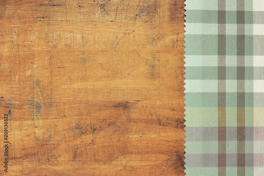 Obraz premium Tablecloth on grunge wooden background