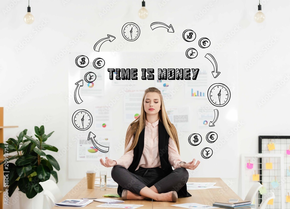 Fototapeta premium calm businesswoman meditating in lotus position on table in office with time for money inscription and money and time circuit