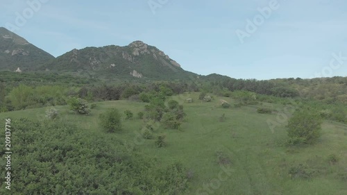 AERIAL view Flight over a country road. 4K Made on Mavik Air 100kbps. Mountain view photo