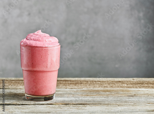 glass of pink milkshake