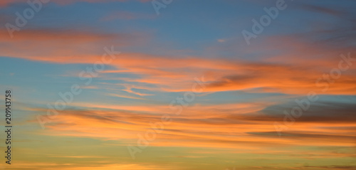 Wispy clouds at sunset
