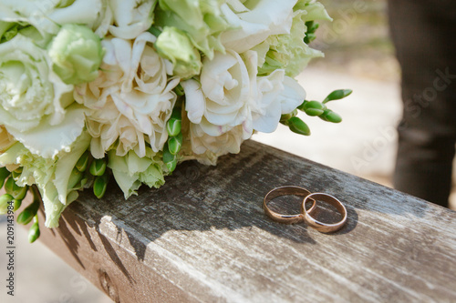 Wedding bouquet with rings on a tree