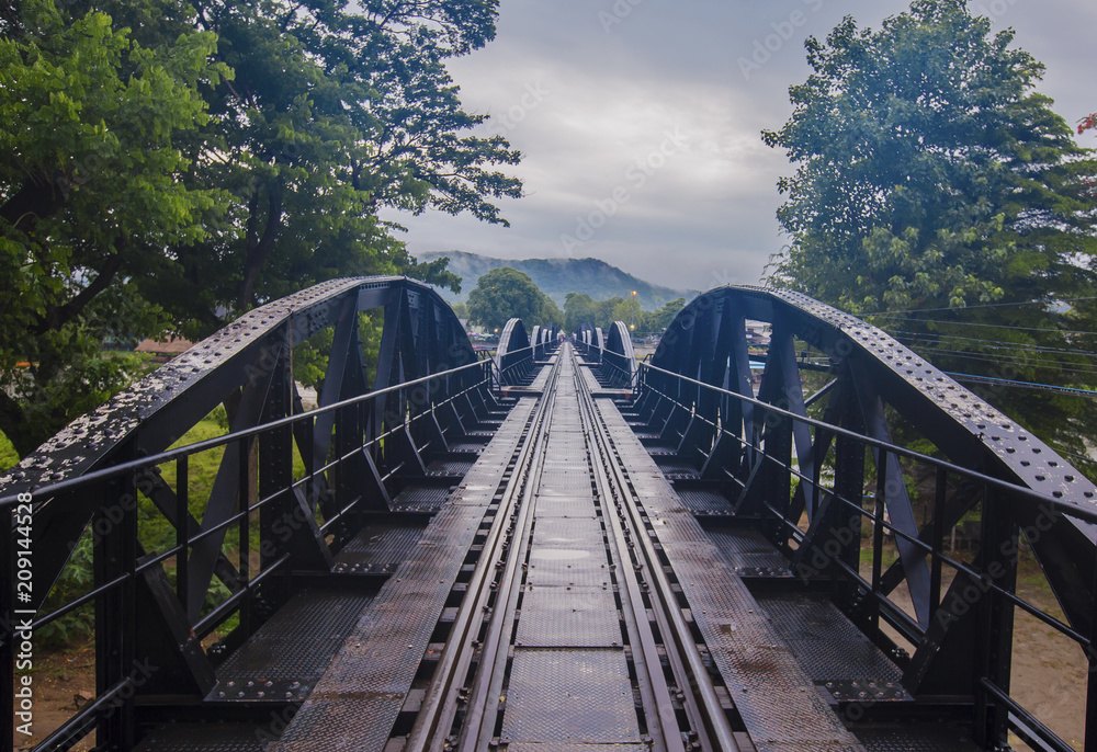 Bridge over the River Kwai with atmosphere after rain /Thailand