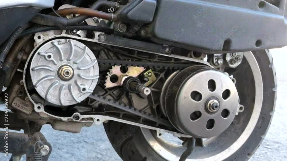 belt replacement pulley transmission on the scooter. continuously variable transmission (CVT) belt replacement pulley transmission on the scooter. continuously variable transmission (CVT)