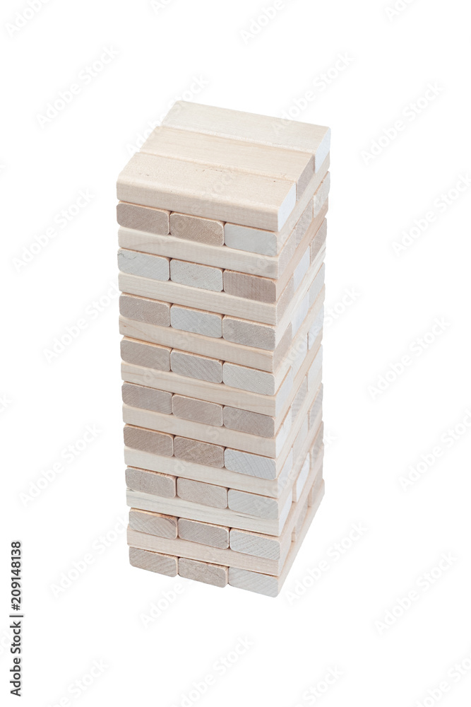 Wooden blocks tower isolated on white background. desktop game closeup Wooden blocks tower isolated on white background. desktop game closeup