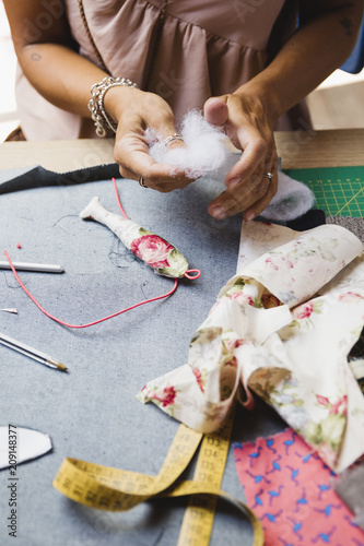 Woman creating accessories for the clothes