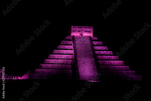 Night view of Kukulkan pyramid in ancient Mayan city Chichen Itza, Mexico photo