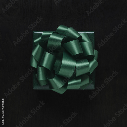 Top view of wrapped Christmas present with bow