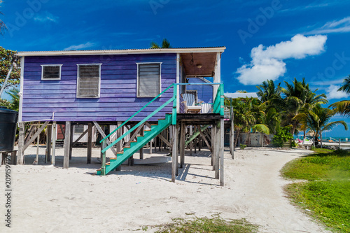 Wooden house on stilts at Caye Caulker island, Belize photo