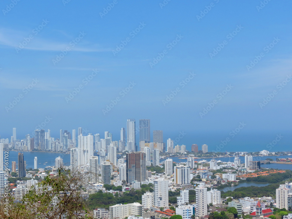 Panoramic view of the coastline of the city and the sea with blue sky with some boats or ships   