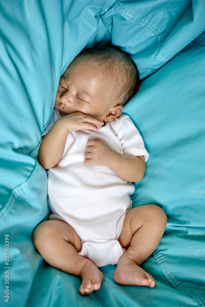 Cute Baby sleeping in a Bean Bag Stock Photo | Adobe Stock