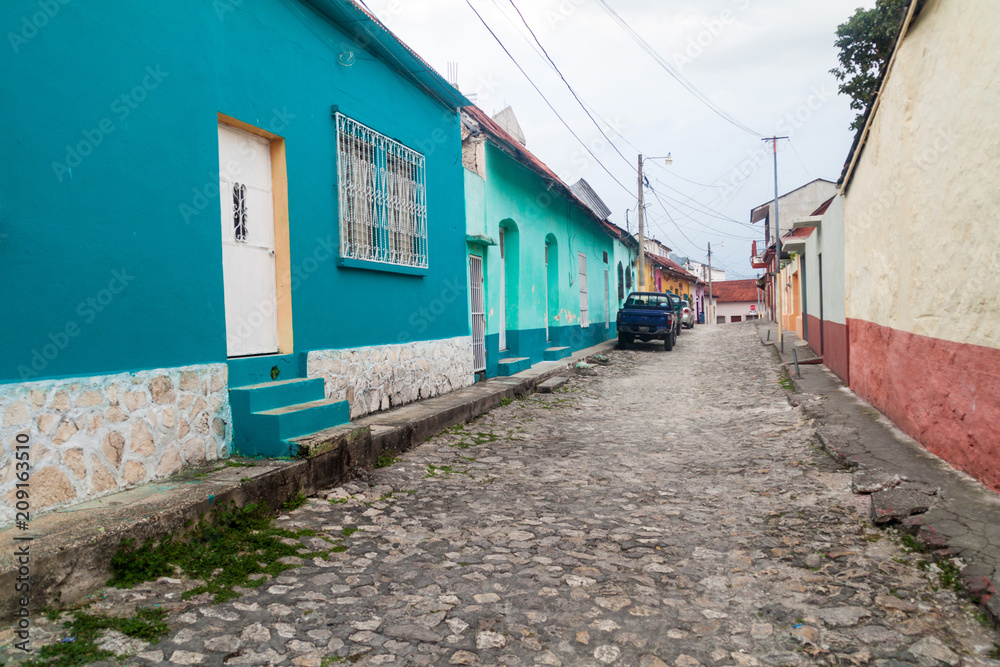 Narrow cobbled street in Flores, Guatemala