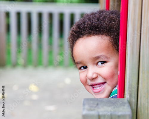 Happy little boy in a playground