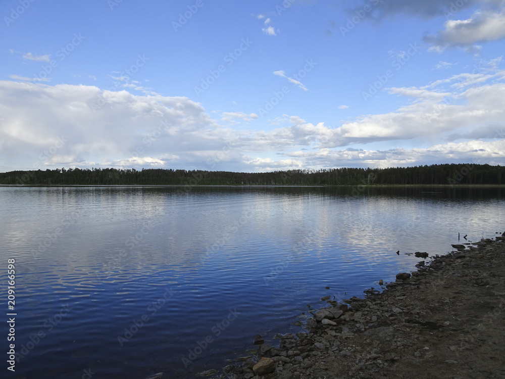 Summer landscape: a serene Sunny day on the lake