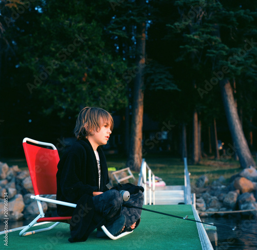 Young boy fishing on Lake Almanor photo