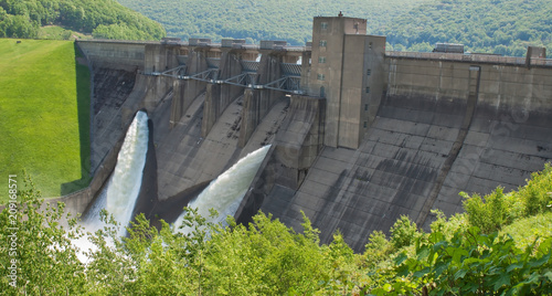 Warren, Pennsylvania, USA 5-23-2018 Kinzua Dam outflow below the Allegheny Reservoir. The Allegheny River flows from the dam south to Pittsburgh photo