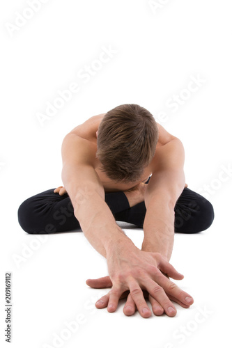 Yoga and relaxation. Attractive man. White background. 