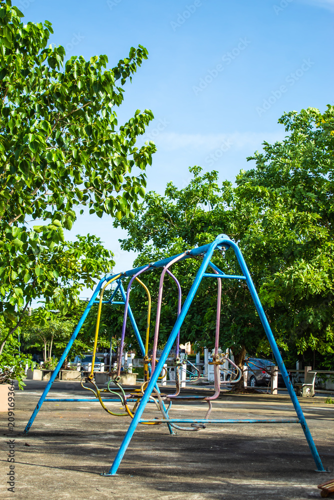 Fototapeta premium Swing chairs for children in park.