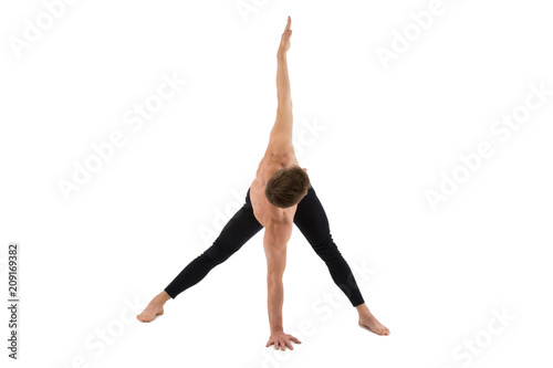 Yoga and a healthy lifestyle. Sexy man. White background. 