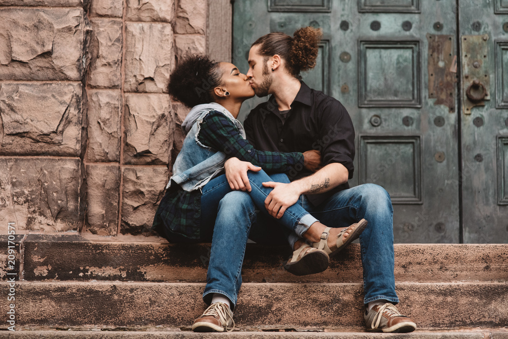 Portraits of a diverse couple in their twenties