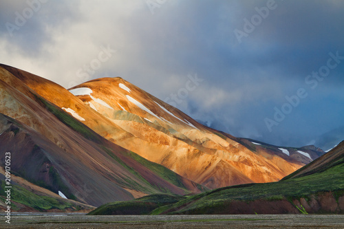 Icelandic mountain landscape at sunset. Colorful volcanic mountains in the Landmannalaugar geotermal area. One of the parts of Laugavegur trail photo