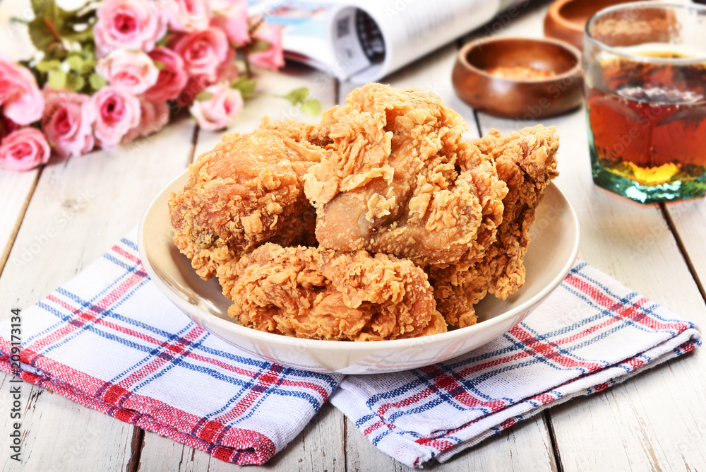Crispy fried chicken on wooden table Crispy fried chicken on wooden table