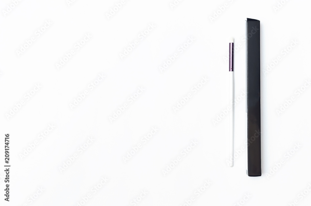 New make up brush in the black box isolated on white background. New make up brush in the black box isolated on white background.