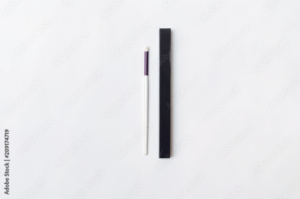 New make up brush in the black box isolated on white background. New make up brush in the black box isolated on white background.