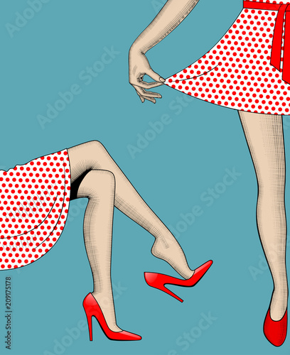 Woman's legs and hand pull the edge of the polka-dot dress