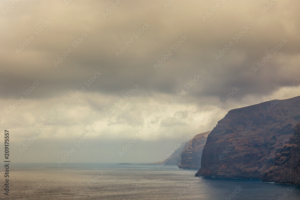 cloudy cliffs of Los Gigantes in Tenerife, Canary Islands, Spain