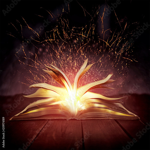 Wallpaper Mural sparks fly from magic book Torontodigital.ca