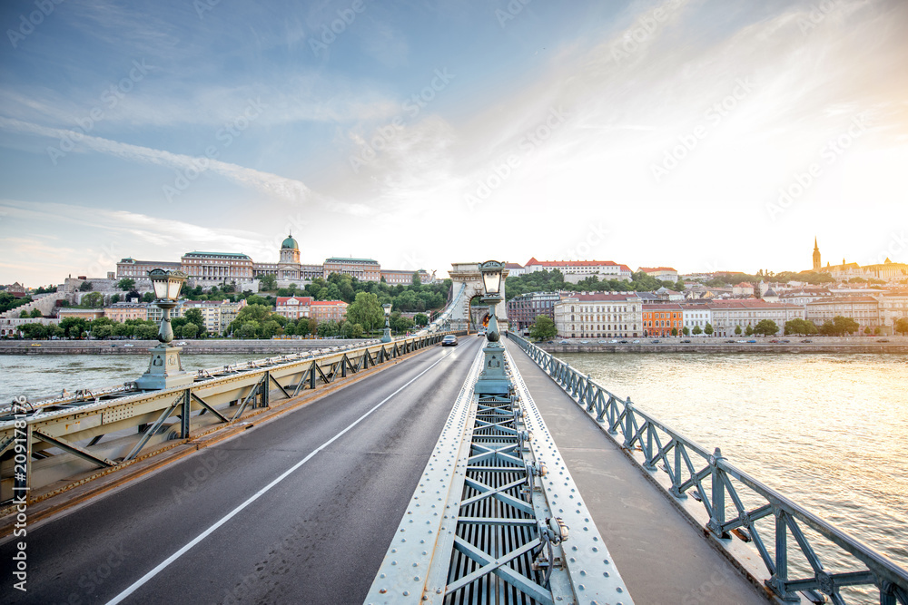 Beautiful cityscape view on the famous Chain bridge and Buda riverside during the sunset in Budapest city, Hungary