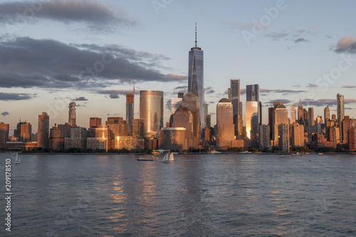 New york city skyline daytime sun clouds blue golden hour © Marieke Feenstra