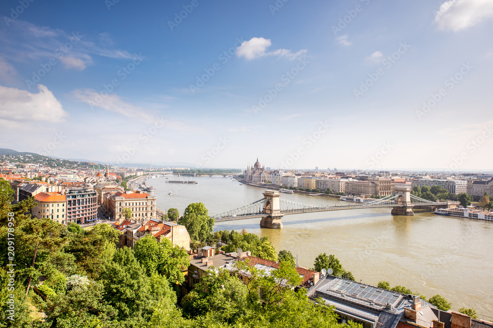 Panoramic view on Budapest city with Chain bridge and famous Parliament building during the morning light in Hungary