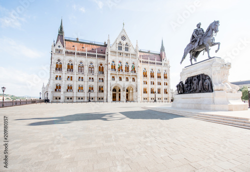 Morning view on the famous Parliament building with statue of Gyula Andrassy in Budapest, Hungary