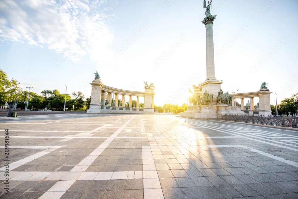Morning view on the empty Heroes square with monument and column during the sunny weather in Budapest, Hungary