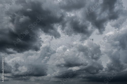 Dark storm clouds before rain used for climate background. Clouds become dark gray before raining. Dramatic background.