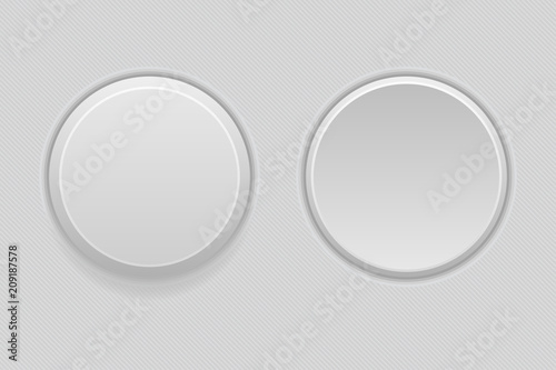 Pushed and normal gray round interface buttons