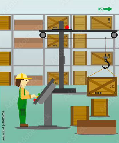 woman working in the warehouse behind the crane control panel