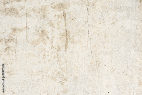 Wall fragment with scratches and cracks