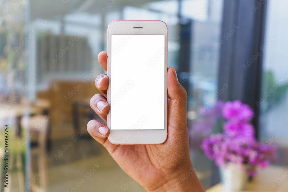 Man's hands holding smartphone with blank white screen can be add your texts or others, empty copy space for advertising, product display. Man's hands holding smartphone with blank white screen can be add your texts or others, empty copy space for advertising, product display.