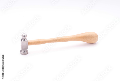 Hammer with wooden handle isolated on white background. photo