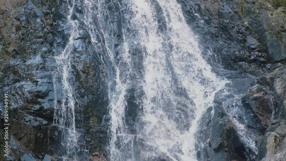 Close Up Waterfall Flowing Through Pass Rock Close Up Waterfall Flowing Through Pass Rock