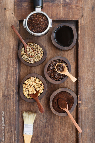 Close up of coffee beans in wooden bowl