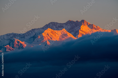 Dramatic landscape Kangchenjunga mountain with colorful from sunlight at Sandakphu photo