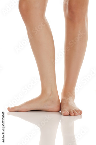 beautifully groomed bare feet on white background © vladimirfloyd